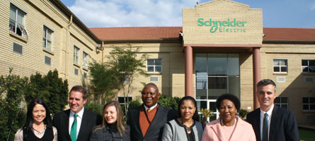 [From left]: Jacqui Gradwell, vice president, marketing and communications; Wilhelm Swart, vice president, industry and mining cluster; Zanelle Dalglish, head of sustainable development; Joe Madungandaba, chief executive officer, Community Investment Holdings; Canninah Mapena, energy division director; Dr Anna Mokgokong, executive chairperson, Community Investment Holdings; Eric L&#233;ger, country president for Schneider southern Africa. 